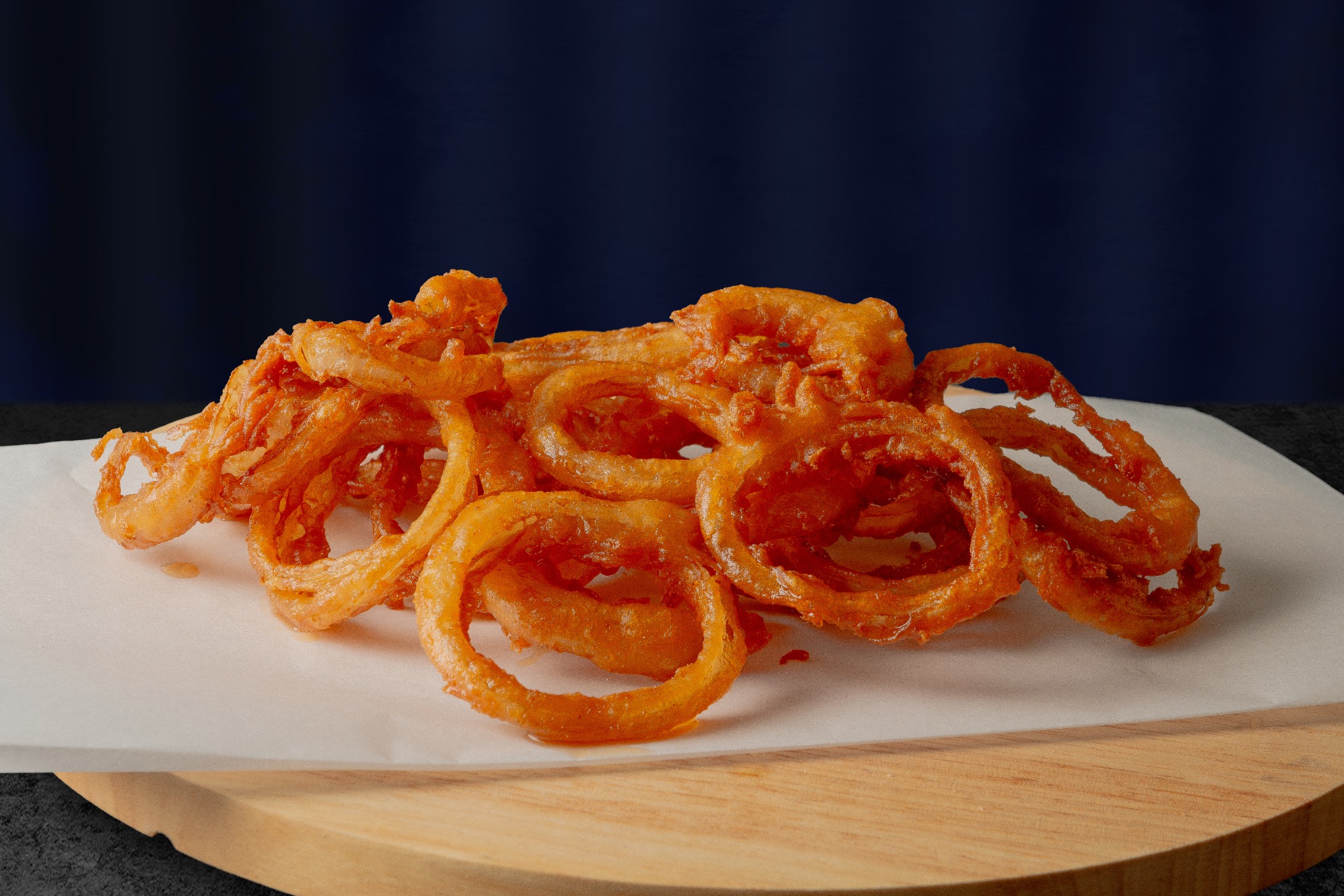 Thin, crisp golden onion rings at Fishermans Choice